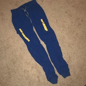Royal blue joggers size XS yellow straps frnt/back